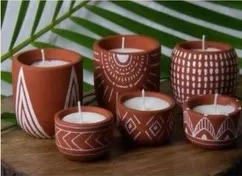 Carved terracotta jar candles