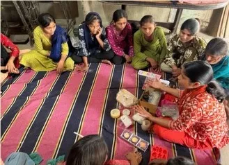 Young women gathered in a learning circle